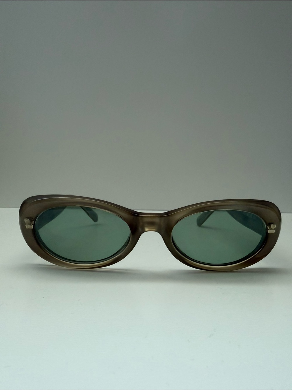 Versace Women's Sunglasses in Light Olive Green with Silver Medallions